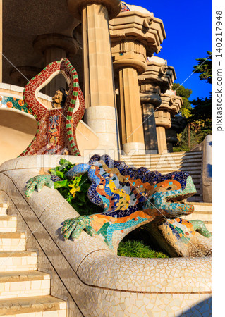 Multicolored mosaic dragon salamander of Gaudi in Park Guell, Barcelona, Spain 140217948