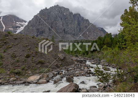Dramatic mountain landscape with river in Aktru Valley, Altai Mountains Dramatic mountain landscape with river in Aktru Valley, Altai Mountains 140218043