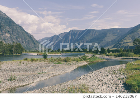 Chulyshman Valley river landscape with mountains and gravel banks in summer Chulyshman Valley river landscape with mountains and gravel banks in summer 140218067