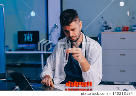 Attractive student of chemistry working in laboratory Attractive student of chemistry working in laboratory 140218184