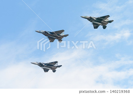 Delta formation flight of Japan Air Self-Defense Force Tactical Fighter Training Group F-15DJ Eagles. Delta formation flight of Japan Air Self-Defense Force Tactical Fighter Training Group F-15DJ Eagles. 140219368