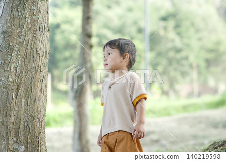 asian kid playing in park 140219598