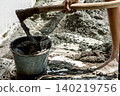 bucket with cement 140219756