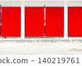 a large red plastic window on a white wall 140219761