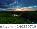 Early summer in Soni Highlands: A beautiful sunset sky after dusk and its reflection in Okame Pond ① 140220719