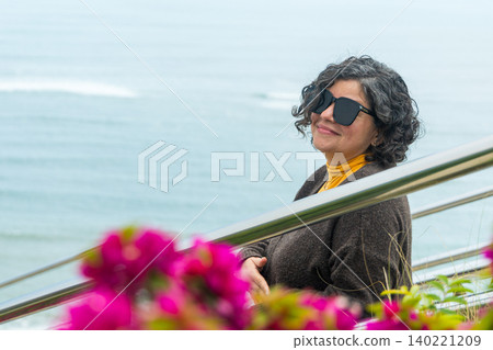 A woman wearing sunglasses A woman wearing sunglasses 140221209