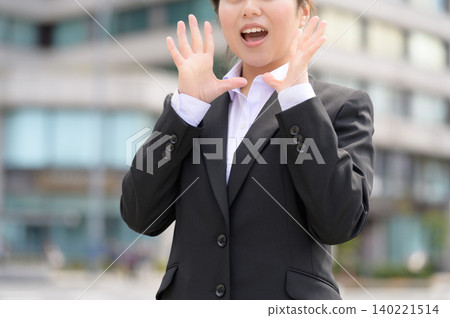 A Japanese woman in her 20s working for a company makes an appeal. A Japanese woman in her 20s working for a company makes an appeal. 140221514