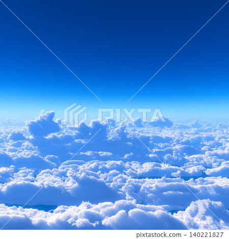 蔚藍的天空和綿延的地平線,下方是一片雲海,構成了一幅令人嘆為觀止的畫面。 蔚藍的天空和綿延的地平線,下方是一片雲海,構成了一幅令人嘆為觀止的畫面。 140221827