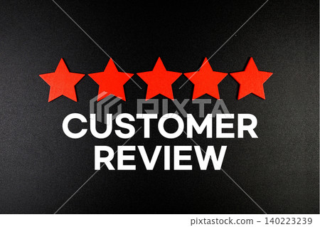 Consumer Review text with five star on black background Consumer Review text with five star on black background 140223239