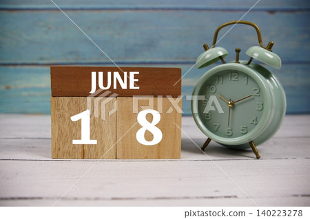 Wooden Calendar Showing the Date of June 18th. Day 18 of June Month Wooden Calendar Showing the Date of June 18th. Day 18 of June Month 140223278