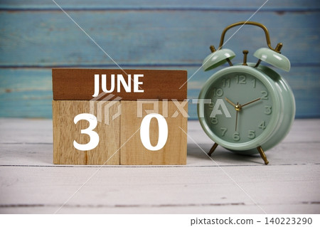 Wooden Calendar Showing the Date of June 30th. Day 30 of June Month Wooden Calendar Showing the Date of June 30th. Day 30 of June Month 140223290