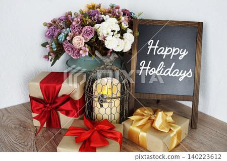 Happy Holidays message written on easel blackboard Happy Holidays message written on easel blackboard 140223612