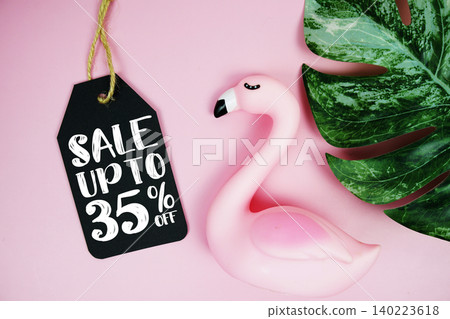 Price tag Sale 35% with summer decorations on pink background Price tag Sale 35% with summer decorations on pink background 140223618