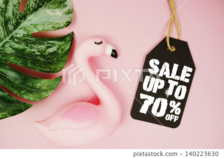 Price tag Sale 70% with summer decorations on pink background Price tag Sale 70% with summer decorations on pink background 140223630