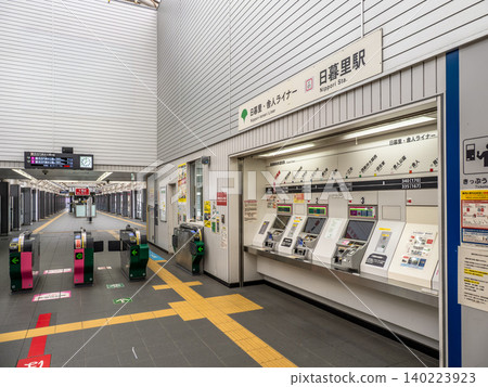 Automatic ticket machines and ticket gates at Nippori-Toneri Liner's Nippori Station Automatic ticket machines and ticket gates at Nippori-Toneri Liner's Nippori Station 140223923