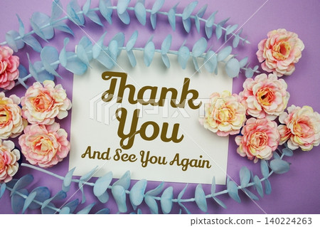 Thank You text written on paper card with flowers decoration Thank You text written on paper card with flowers decoration 140224263