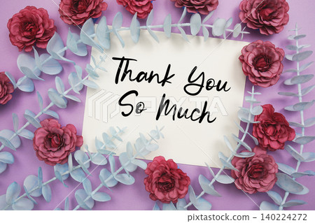 Thank You text written on paper card with flowers decoration Thank You text written on paper card with flowers decoration 140224272