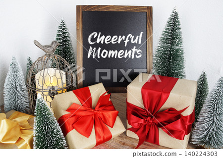 Cheerful Moments message written on easel blackboard Cheerful Moments message written on easel blackboard 140224303