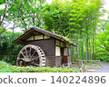 An old watermill and a green bamboo grove 140224896