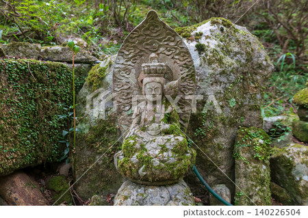 Guan Yin statue at sacred forest in Futagoji temple, Kunisaki, Oita 140226504