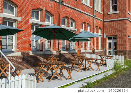 Outdoor patio of cafe seat by brick building at Mojiko town, Kitakyushu Outdoor patio of cafe seat by brick building at Mojiko town, Kitakyushu 140226514