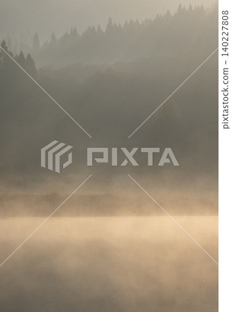 Lake Onbara, its surface shrouded in morning mist. Lake Onbara, its surface shrouded in morning mist. 140227808