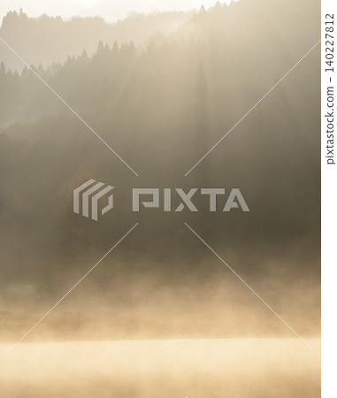 Lake Onbara, its surface shrouded in morning mist. Lake Onbara, its surface shrouded in morning mist. 140227812