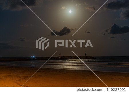 Full Moon Over Calm Nighttime Beach Waters Full Moon Over Calm Nighttime Beach Waters 140227991