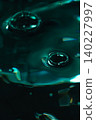 321.Dual Ripple Impact on Glossy Teal-Green Liquid 140227997