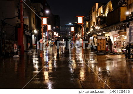 A fantastical bokeh background image resembling Asakusa Denpoin Street on a rainy night. A fantastical bokeh background image resembling Asakusa Denpoin Street on a rainy night. 140228456