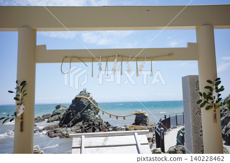 Viewing the Meoto Iwa (Husband and Wife Rocks) of Futamiura, Ise City, with whitecaps rising due to strong winds, through the torii gate. Viewing the Meoto Iwa (Husband and Wife Rocks) of Futamiura, Ise City, with whitecaps rising due to strong winds, through the torii gate. 140228462