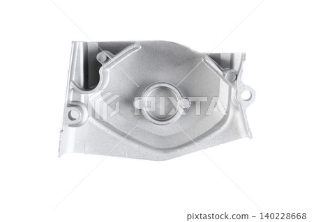 Motorcycle engine aluminum sprocket drive chain cover inner side view isolated on white. Motorcycle engine aluminum sprocket drive chain cover inner side view isolated on white. 140228668