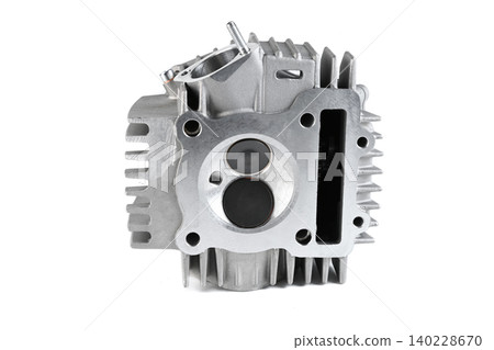 Motorcycle engine cylinder head combustion chamber with valves isolated on white. Motorcycle engine cylinder head combustion chamber with valves isolated on white. 140228670