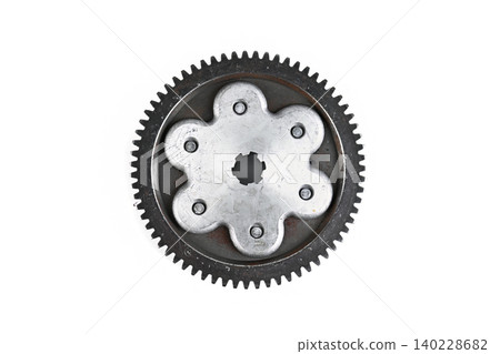 Motorcycle engine starter clutch gear assembly with six lobe flange isolated top view. Motorcycle engine starter clutch gear assembly with six lobe flange isolated top view. 140228682