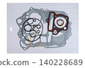 Motorcycle engine complete gasket kit set with rubber o-rings in vacuum packaging. 140228689