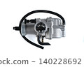 Motorcycle engine aluminum carburetor assembly with open throttle slide bore isolated. 140228692