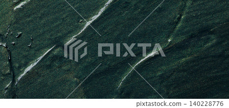 Abstract dark green flowing paint texture with organic brush strokes and movement 140228776