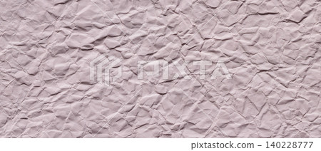 Crumpled pink paper texture background with wrinkles for creative design projects 140228777