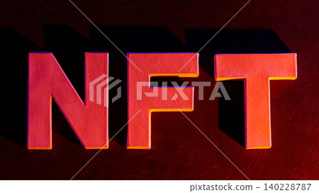 Bold NFT letters in red and orange gradient with glowing neon effect on dark background Bold NFT letters in red and orange gradient with glowing neon effect on dark background 140228787