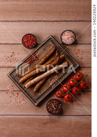 Thin chicken or pork sausages grilled or barbecued. Grilled sausages Thin chicken or pork sausages grilled or barbecued. Grilled sausages 140228924