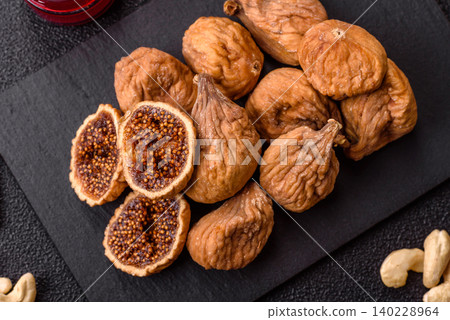 Dried whole fig as an ingredient for sweet desserts. Dried figs Dried whole fig as an ingredient for sweet desserts. Dried figs 140228964