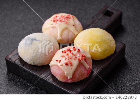 Japanese sweet frozen mochi with rice dough, fruit, and chocolate filling. Japanese mochi 140228978