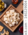 White feta, tofu, or mozzarella cheese cubes with herbs. White mozzarella cheese 140229004