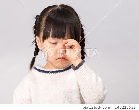 Tired Asian Little Girl Rubbing Eyes Feeling Sleepy Tired Asian Little Girl Rubbing Eyes Feeling Sleepy 140229532