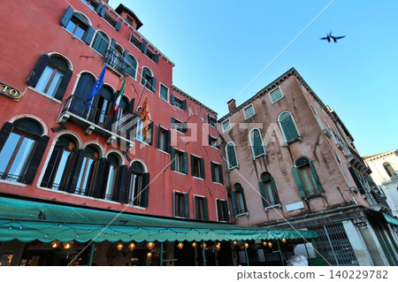Venice, Italy: A view of the old town from the Rialto Bridge in the early morning. 140229782