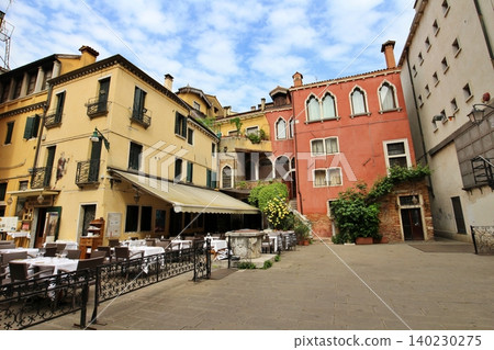 Venice, Italy: Early morning in the San Marco district, a restaurant terrace before opening hours. Venice, Italy: Early morning in the San Marco district, a restaurant terrace before opening hours. 140230275