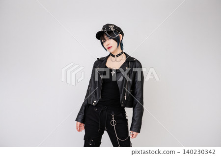 Cool female model in punk fashion Cool female model in punk fashion 140230342