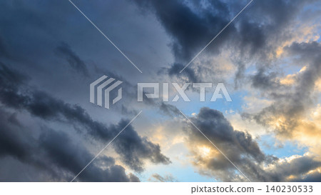 Dramatic Storm Clouds in the Evening Sky Dramatic Storm Clouds in the Evening Sky 140230533