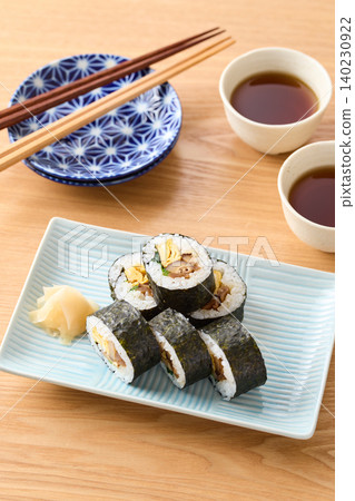 Thick sushi rolls served on a plate Thick sushi rolls served on a plate 140230922