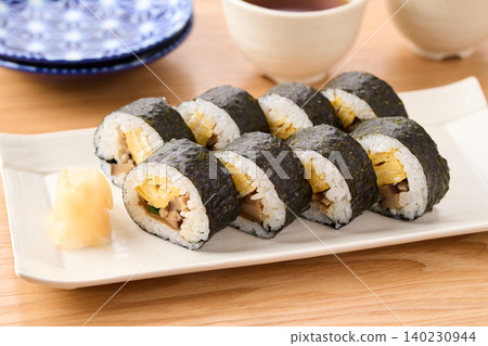 Thick sushi rolls served on a plate Thick sushi rolls served on a plate 140230944